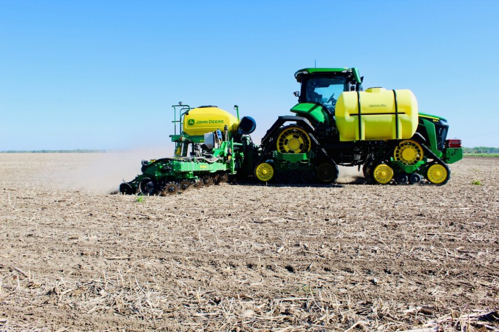 wearparts NPD image showing tractor moving across a field